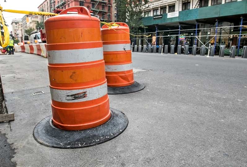 Orange barrels mark construction a project in Manhattan.